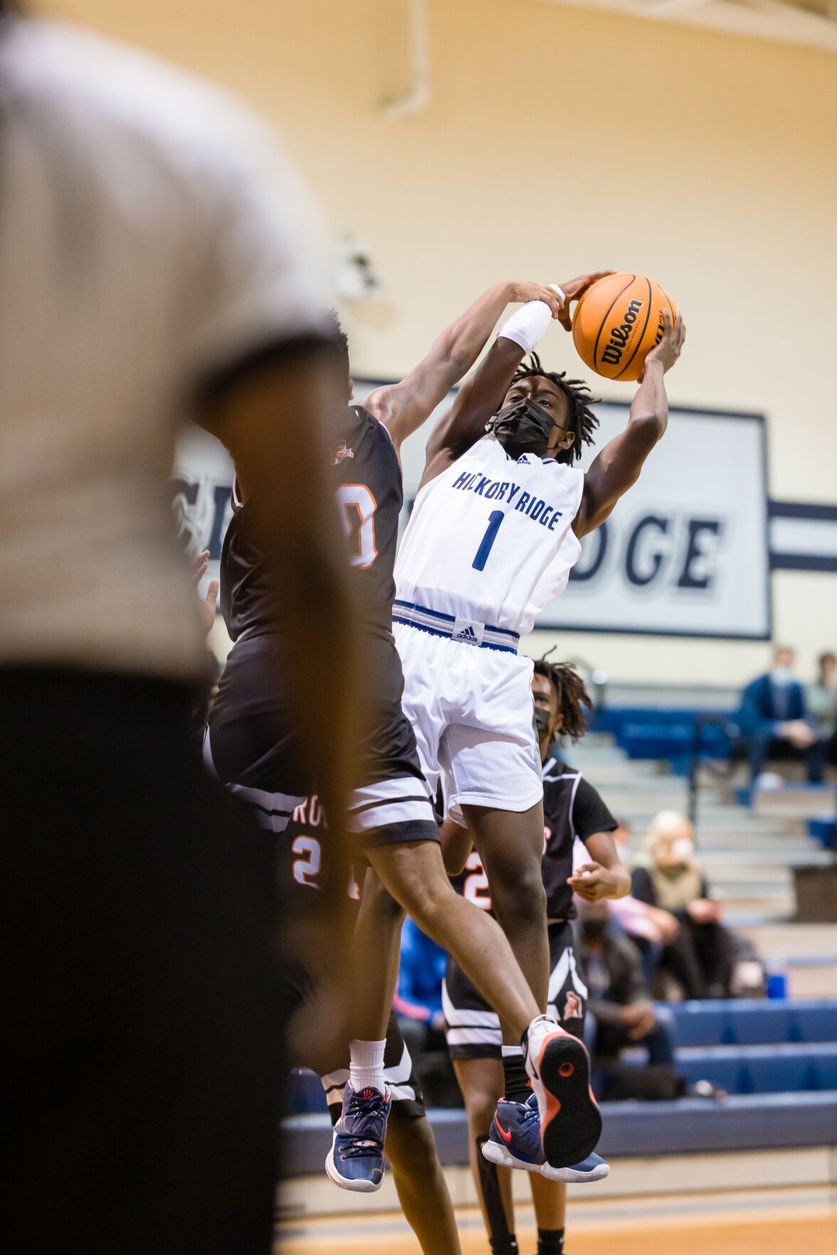 Boys Basketball: Hickory Ridge RaginÕ Bulls defeated the Northwest Cabarrus Trojans 64-56.